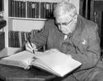 Ralph Vaughan Williams signing the guest book at Yale University in 1954