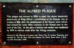 A plaque in the City of London noting the restoration of the Roman walled city by Alfred.
