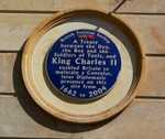 A blue plaque in Place Beb Bhar, Tunis, Tunisia. The text, in English, reads 'British Tunisian Society - A Treaty between the Dey, the Bey, and the Soldiers of Tunis, and King Charles II' (© Andy Mabbett, CC BY-SA 4.0)
