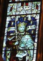 King Alfred the Great pictured in a stained glass window in the West Window of the South Transept of Bristol Cathedral. (© Charles Eamer Kempe, CC BY 3.0)